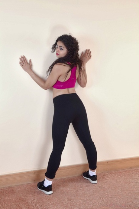 Brunette hottie in workout clothes Sierra spreads her tight and hairy vagina